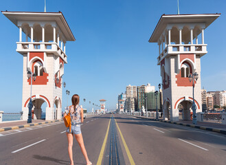 Wall Mural - People walk the Stanley Bridge, popular landmark of Alexandria, Egypt