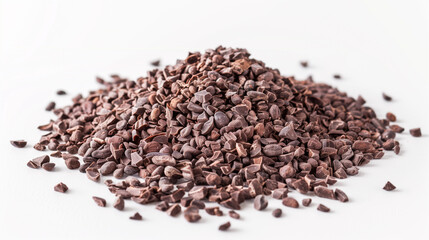 Wall Mural - Pile of cocoa nibs next to whole cocoa beans on a plain white surface