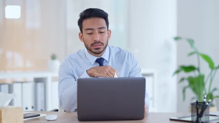 Wall Mural - A modern business man feeling sick with covid fatigue while working online at a desk on his laptop. Closeup of a male corporate manager blowing his nose. An ill office worker frustrated at work.