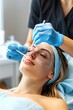 © Murda - Close-Up of Woman's Facial Procedure, Skincare Specialist Performing Facial Treatment