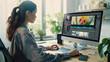 © VK Studio - A young woman uses advanced editing software on a large desktop monitor, working diligently in a bright, plant-filled home office.