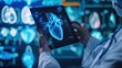 © jureephorn - A cardiologist analyzes electronic medical record reports and monitors the patient's heart function on a digital tablet. medical technology concept