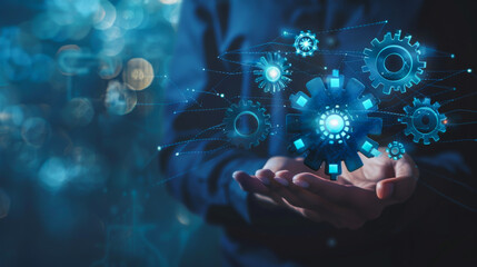 A person is holding a blue gear in their hand. The gears are all different sizes and are arranged in a pattern. Concept of technology and innovation, as well as the idea of interconnectedness.