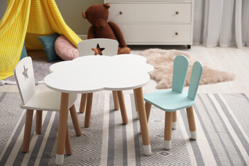 Sticker - Stylish child room interior with table and chairs