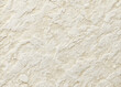 © Adisorn - High-resolution image of a beautiful white stone texture with subtle shine and intricate patterns, perfect for use as a wallpaper or graphic design element.
