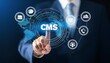 © RAJKISHAN - CMS - Content management system concept, .Businessman using laptop to management cms software for publishing content. Blog promotion, data administration and website optimization concept.