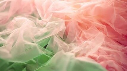 Poster - Delicate layers of pastel fabric blend beautifully, showcasing a graceful flow of colors under gentle illumination, creating a serene and artistic atmosphere