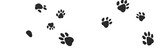 black paw prints in a seamless pattern on a white background,