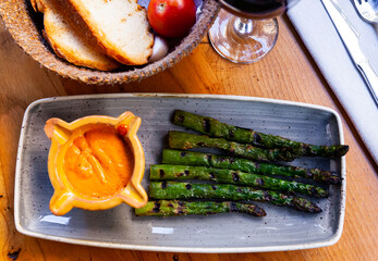 Sticker - Appetizing grilled asparagus dish with Romesco sauce