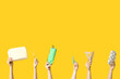 © Pixel-Shot - Female hands with pencil cases, scissors and rulers on yellow background