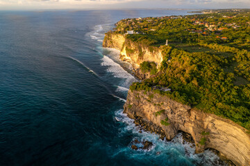 Wall Mural - Rocky cliff coastline and ocean, sea, near Uluwatu temple in Bali, Indonesia