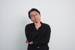 © AnnaJannah - Thoughtful asian businessman with currious face think about solution in isolated white background