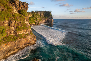 Wall Mural - Rocky cliff coastline and ocean, sea, near Uluwatu temple in Bali, Indonesia