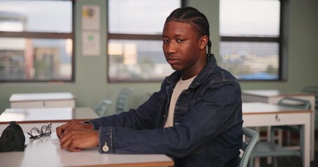 Poster - Student, depression and learning in classroom by desk for education, growth or development with anxiety. Person, portrait and study with mental health in school for lecture, knowledge and scholarship