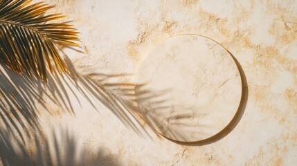 Aufkleber - A marble circle creates soft shadows from palm leaves on a textured wall.