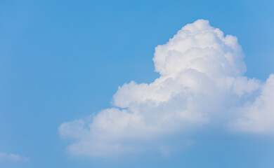 Blue sky on a sunny day. white cumulus clouds