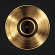 © sornram - Shiny gold vinyl record on a black background, perfect for music themes, nostalgia, and vintage aesthetics.