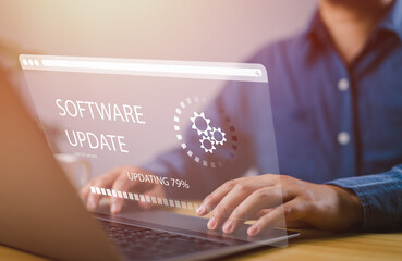 Fototapete - Man working and installing update process. Software updates or operating system upgrades to keep your device up to date with enhanced functionality in new versions and improved security.
