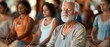 © Sukifli Dakheng - A senior leading a wellness retreat, focusing on mindfulness, yoga, and meditation for all ages