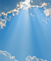 Wall Mural - sunbeam through the haze on blue sky, vertical