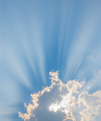 Wall Mural - sunbeam through the haze on blue sky, vertical