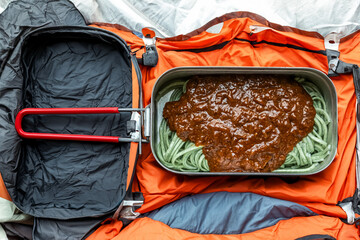 Wall Mural - アウトドアでカレー　 Making spicy curry at a campsite