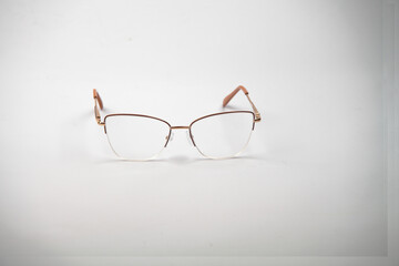 women's glasses. from medical glass. beautiful shape. on an isolated white background.fashionable su