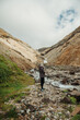 © Cavan - Woman standing alone in Innra Hvannagil gorge, Njarðvík, Iceland