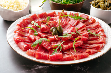 Canvas Print - marble beef carpaccio on a white plate