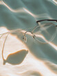 © Nadi - Aesthetics Glasses On Light Background