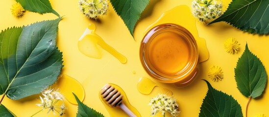 Poster - Top view of linden honey with leaves flowers and copy space image on a colorful background