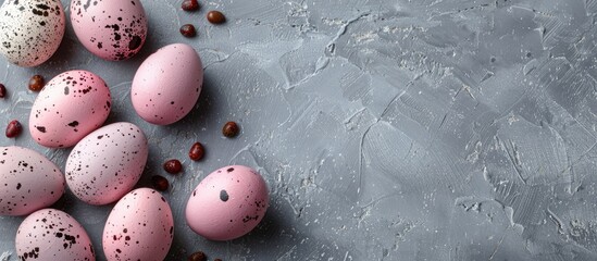 Aufkleber - Happy Easter holiday featuring pink quail eggs on a gray background in a flat lay composition with copy space image