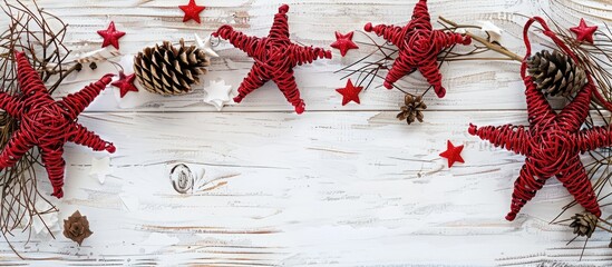 Poster - A festive Christmas scene featuring red rattan stars cones and a white wooden backdrop Ideal for a greeting card with a top down view and space for text or images. Creative banner. Copyspace image