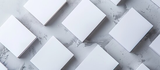 Fototapete - View from above a mock up of blank business cards on a general background providing a template for an identifier in the copy space image