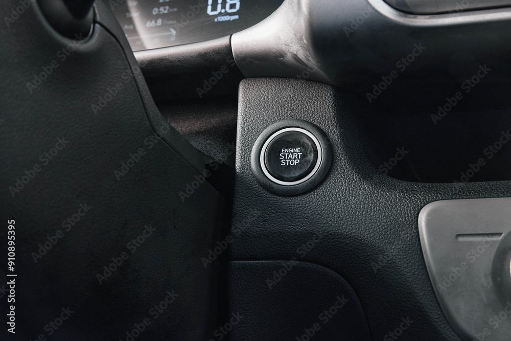 Car steering wheel buttons closeup in parked vehicle at dealership lot ...