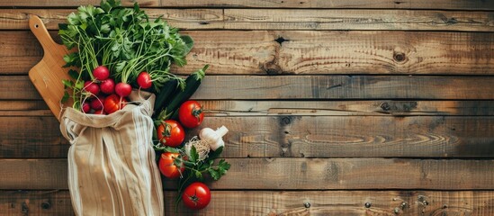 Poster - Fresh vegetables in a reusable shopping bag from a grocery farm shop beside a chopping board on a vintage wooden table ready for making salad Includes copy space image