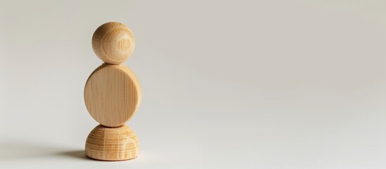 Poster - A wooden figurine proposing with an engagement ring symbolizing love set against a white backdrop for a copy space image