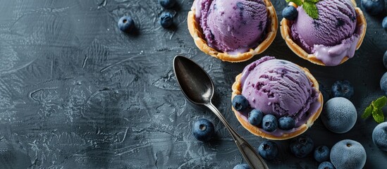 Aufkleber - A summer themed scene on a gray backdrop featuring three servings of blueberry ice cream in a waffle cup with a spoon and blueberries creating a serene copy space image