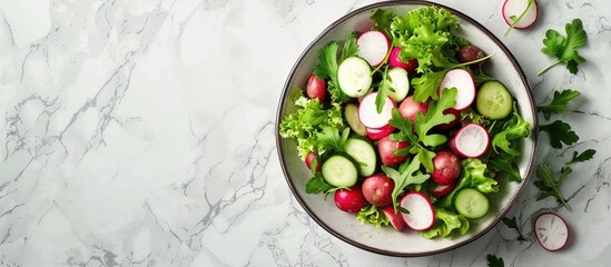 Poster - A spring salad with potatoes radishes cucumbers and greens on a marble table Ideal for vegans featuring a recipe concept Top down view with space for images. Creative banner. Copyspace image