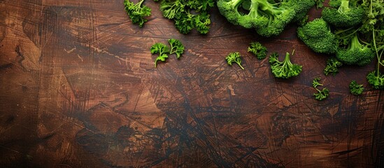 Aufkleber - Top view of organic broccoli florets on a wooden board with copy space image for added text or elements