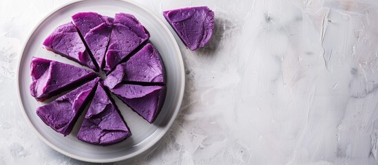 Poster - Purple sweet potato wafer cream on a white plate with copy space image on a white background
