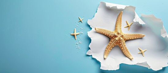 Aufkleber - Summer themed background with a torn hole on white paper showcasing a starfish and sea sand on a blue backdrop ideal for copy space image