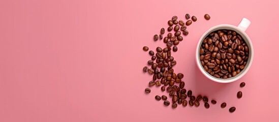 Poster - Pink background enhances the appeal of the cup with coffee beans placed on it creating an aesthetically pleasing copy space image