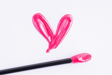 Canvas Print - Pink liquid lipstick and applicator isolated on white background. Swatch of deep pink lip gloss. Top view, flat lay, copy space