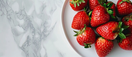 Aufkleber - Strawberries arranged on a plate with a white backdrop ideal for a copy space image