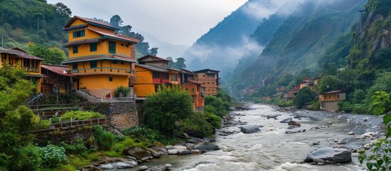 Sticker - Scenic river passing through a picturesque mountain village with serene surroundings and charming mountain houses perfect for a copy space image