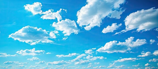 Aufkleber - The expansive blue sky with fluffy clouds creates a serene ambiance in a copy space image