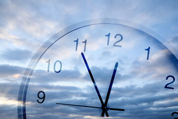 Wall Mural - Time concept. Clock and blue sky with fluffy clouds, double exposure