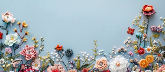 Poster - Embroidered flowers on a background suitable for adding text or images known as a copy space image
