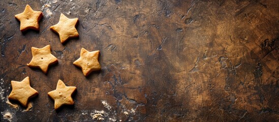 Aufkleber - Three distinct star shapes on uncooked cookie dough with copy space image